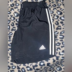 Adidas’s shorts. Pocket w zipper on back. Never worn.